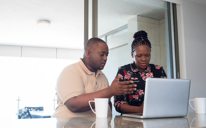 Couple Checking Their Credit Score for Errors